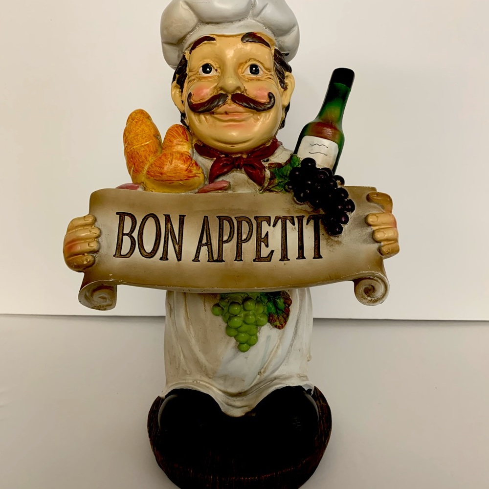 Bon Appetit plastic figurine. It looks rustic & there is staining at the back.